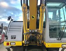 New Holland wheel excavator MH City